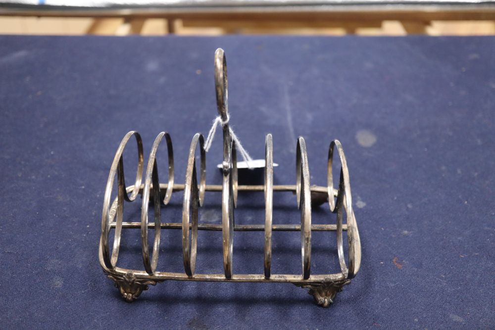 A Victorian silver seven bar toastrack, William Evans, London, 1865, height 13.5cm, 70z.